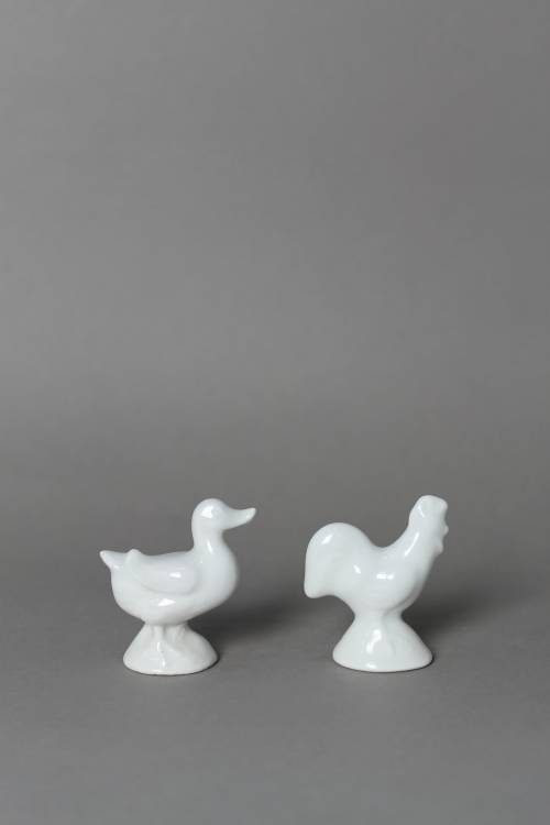 Goose. Small, white glazed figure.