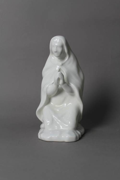 Mary. Small, white glazed figure.